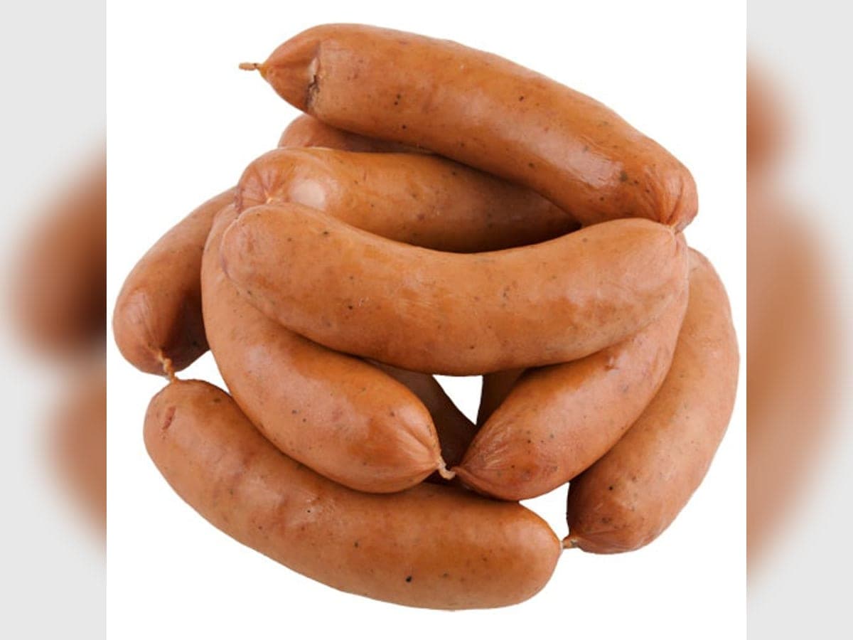 Chorizos carupaneros embutidos y atados con hilo, listos para asar