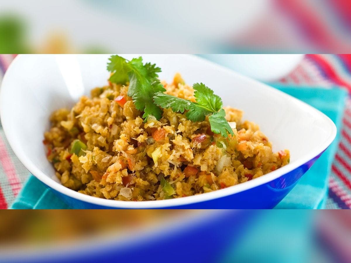 Pisillo de cazón desmenuzado en su sofrito de pimentón, ají dulce y cebollín